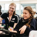 Smiling staff female student eye gaze